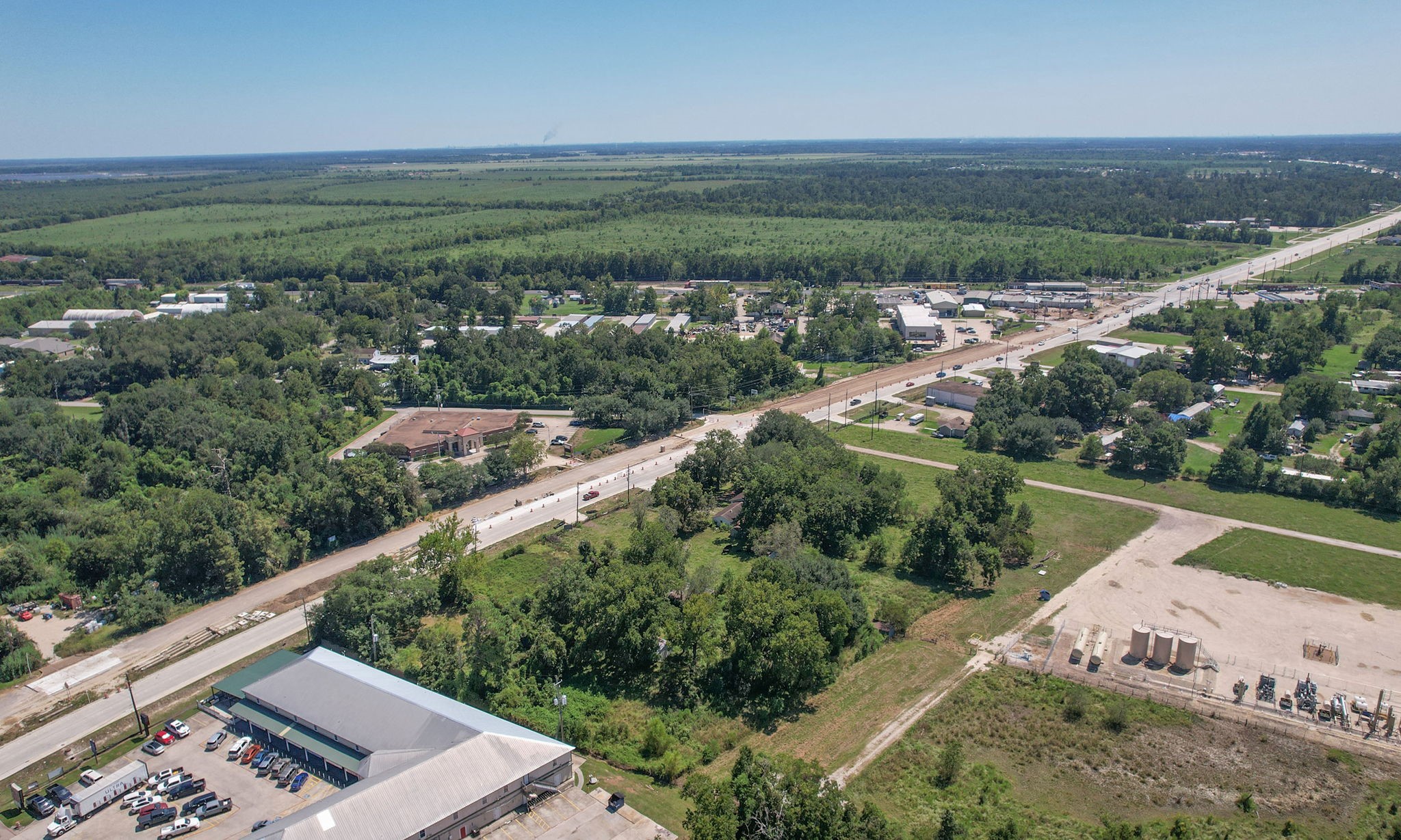 24411 Farm To Market 2100 Huffman, TX 77336 - Photo 5 of 18 a view of a field with an ocean