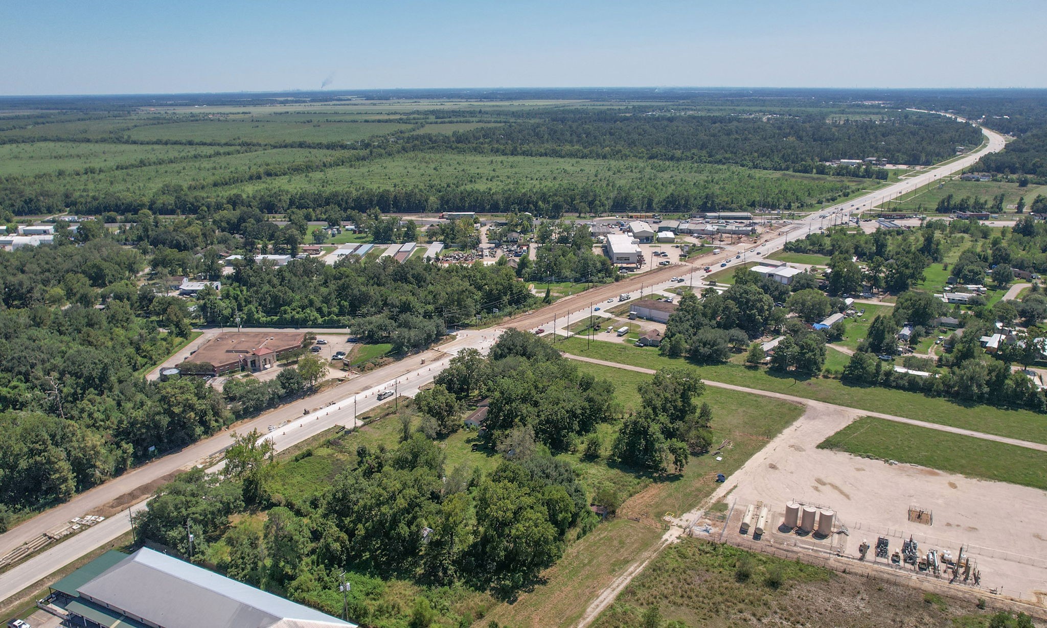 24411 Farm To Market 2100 Huffman, TX 77336 - Photo 6 of 18 a view of a city street view with ocean view