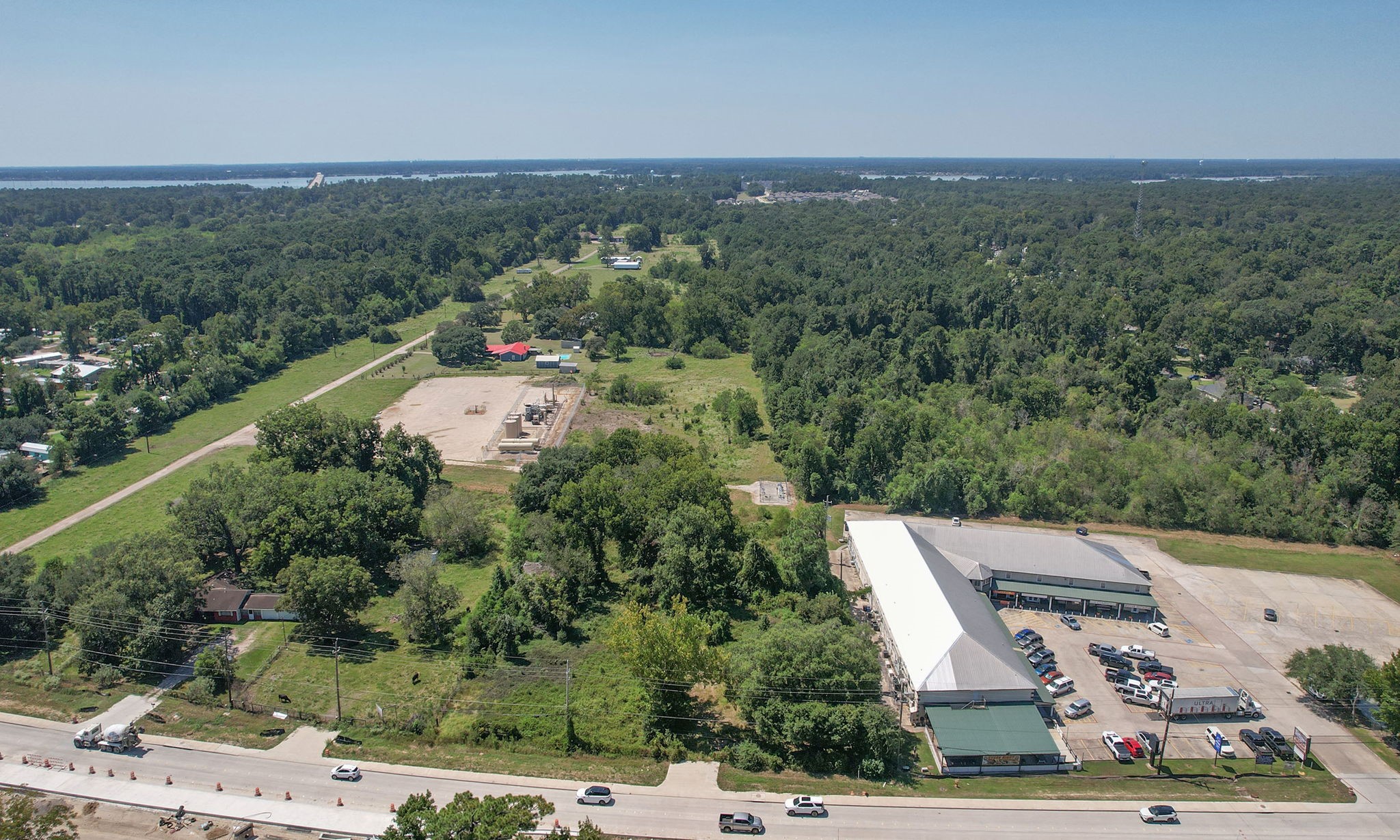 24411 Farm To Market 2100 Huffman, TX 77336 - Photo 10 of 18 an aerial view of a house with a yard