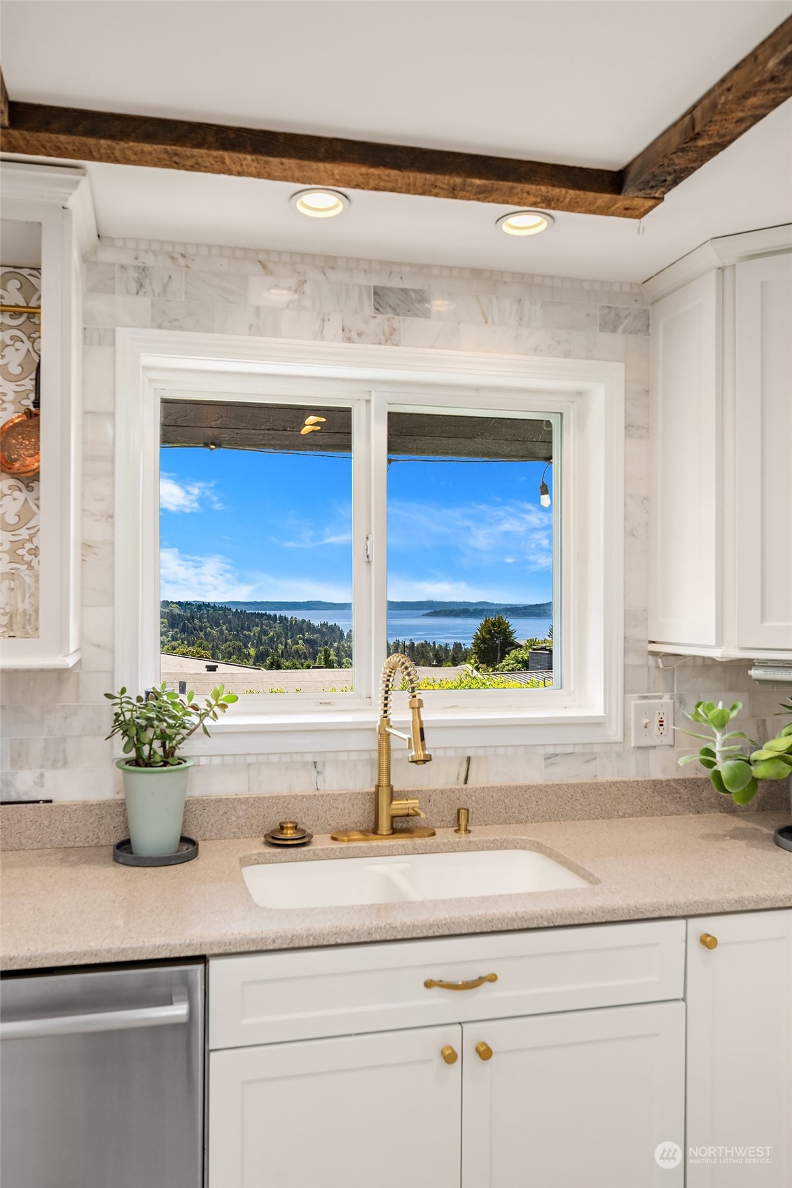 16404 9th Avenue Southwest Burien, WA 98166 - Photo 13 of 40 a bathroom with a sink and a window