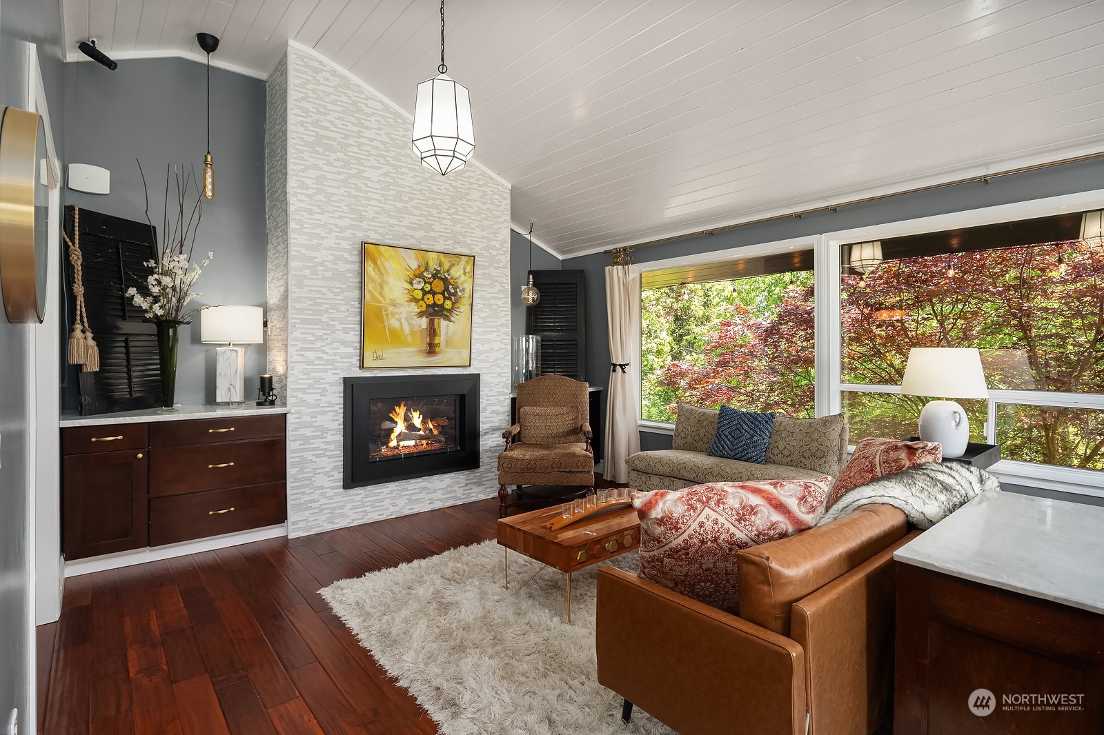 16404 9th Avenue Southwest Burien, WA 98166 - Photo 9 of 40 a living room with furniture and a fireplace