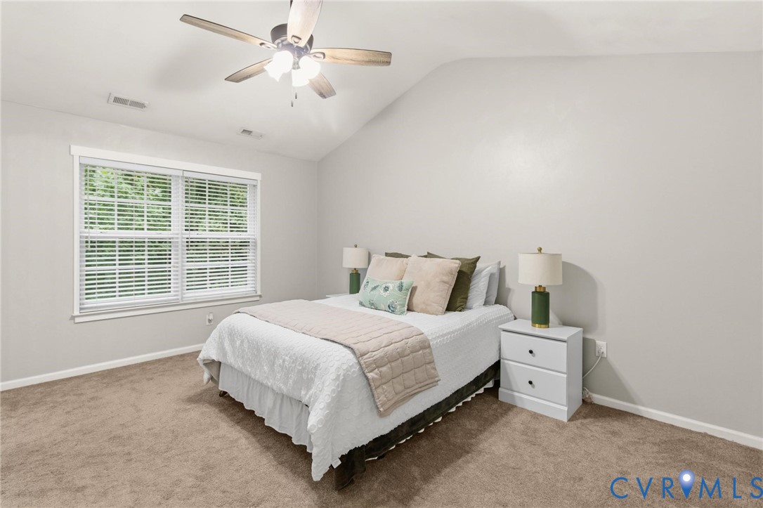 7807 Clover Ridge Place Chesterfield, VA 23832 - Photo 28 of 51 Vaulted ceiling bedroom featuring a ceiling fan wi