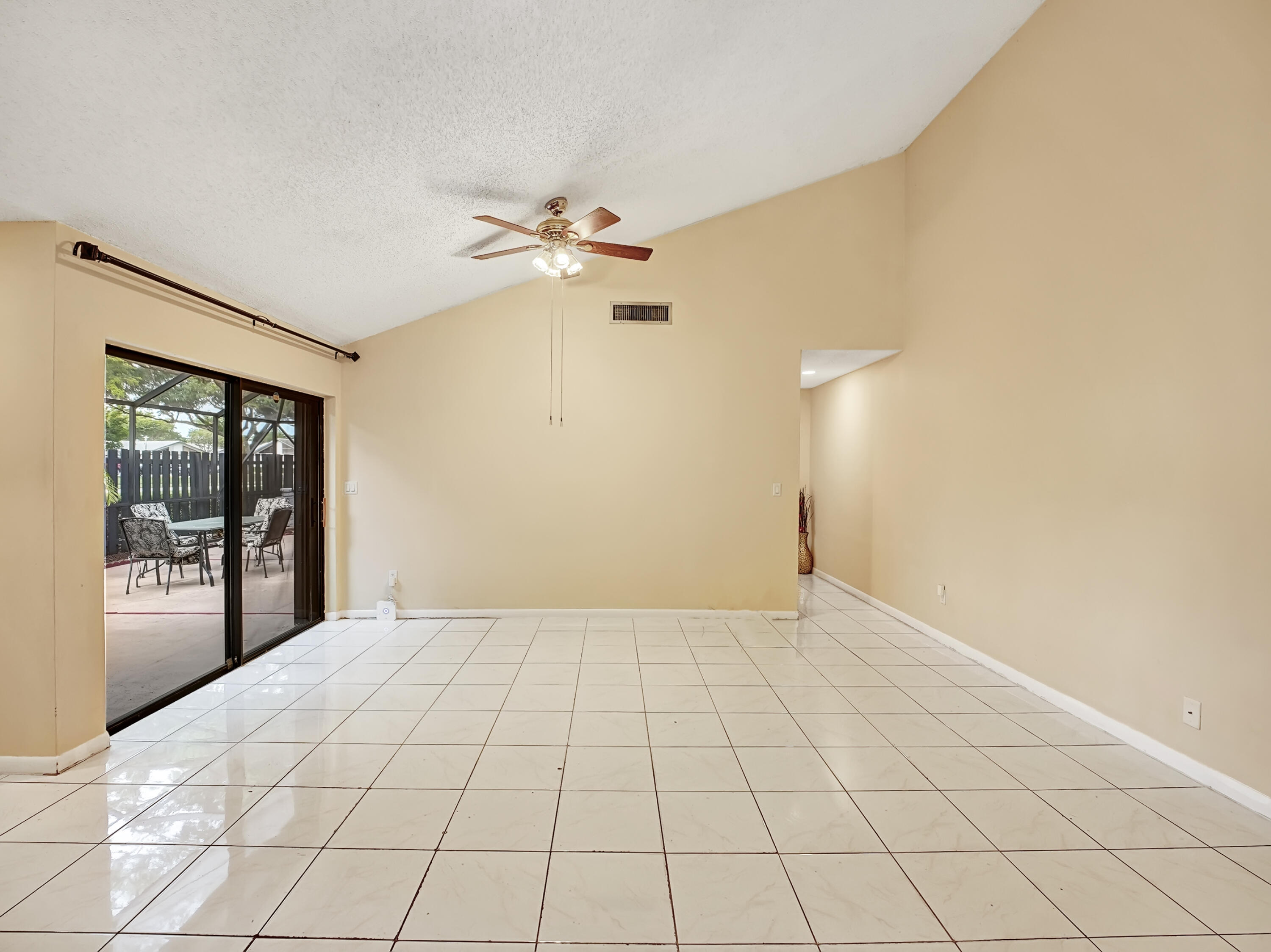 1165 Summit Trail Circle, Unit A West Palm Beach, FL 33415 - Photo 15 of 37 a view of an empty room with a window