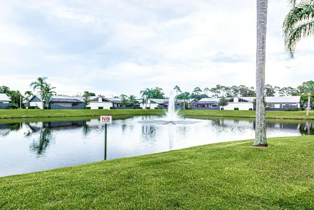 a lake view with a garden