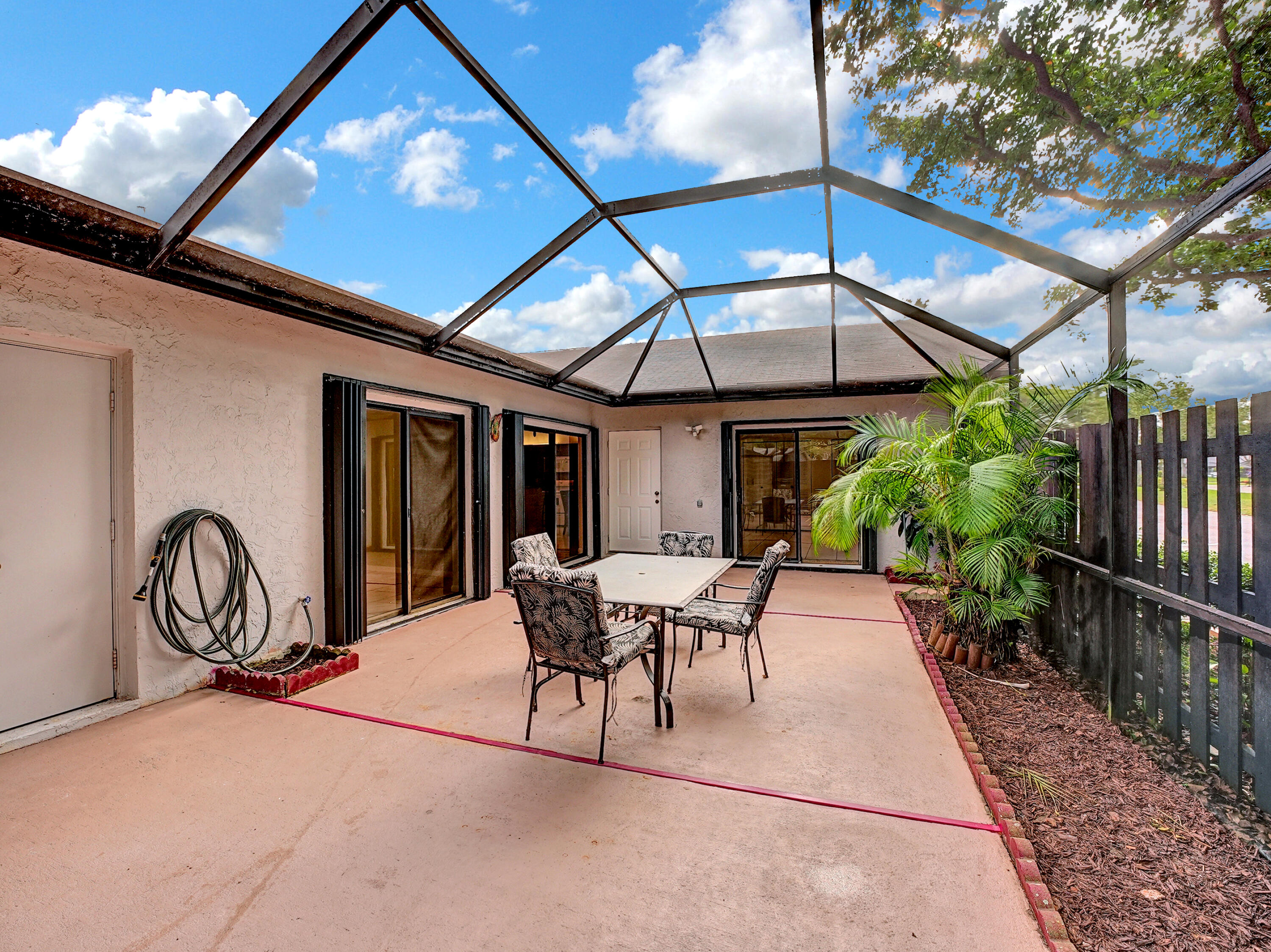 1165 Summit Trail Circle, Unit A West Palm Beach, FL 33415 - Photo 6 of 37 a view of outdoor space yard and patio