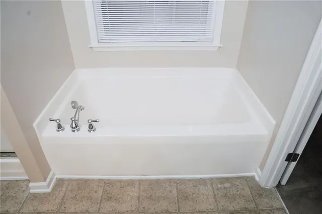 a bathroom with bathtub