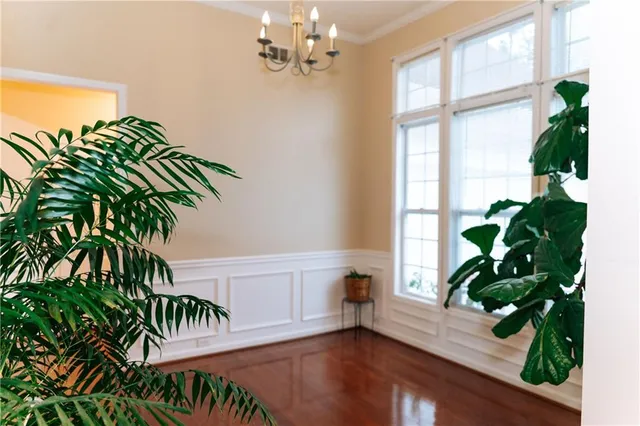 a view of a house with a flower garden