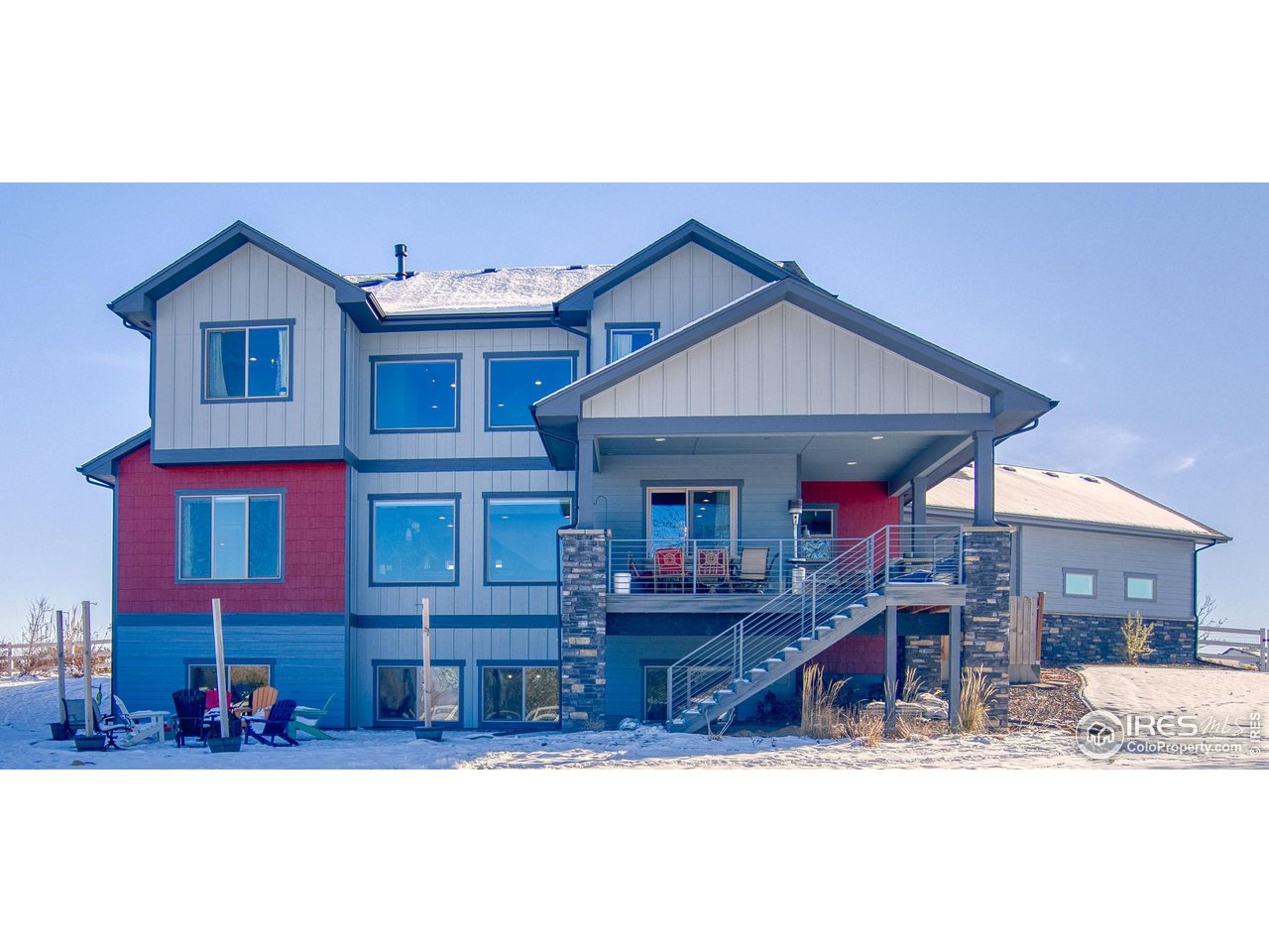 3941 Roper Trail Severance, CO 80524 - Photo 2 of 32 a view of a house with wooden deck