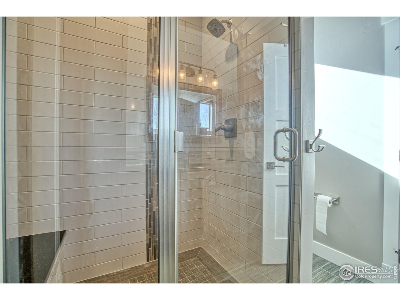 3941 Roper Trail Severance, CO 80524 - Photo 27 of 32 a bathroom with a shower