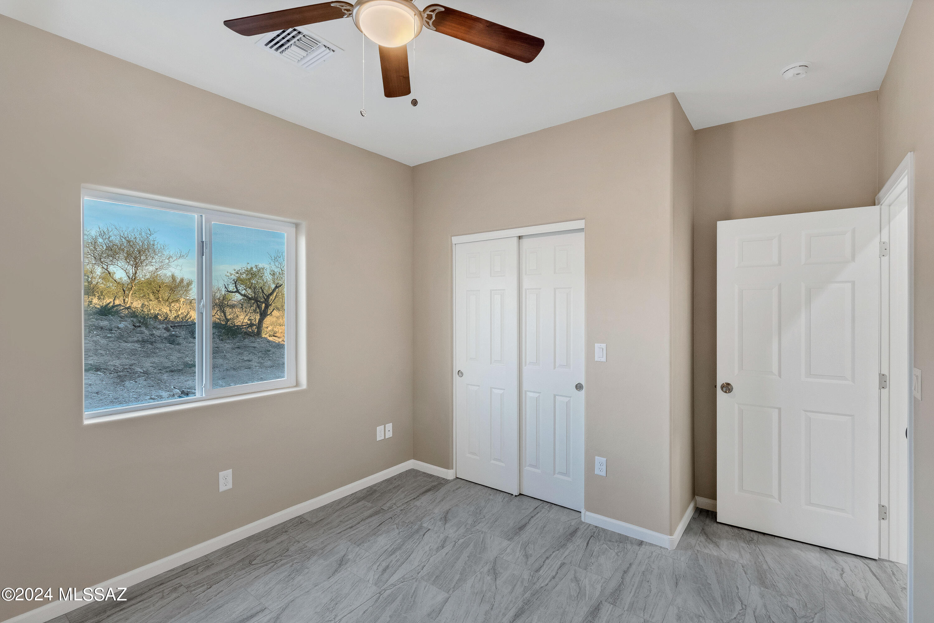 356 Globo Court Rio Rico, AZ 85648 - Photo 28 of 32 wooden floor in an empty room