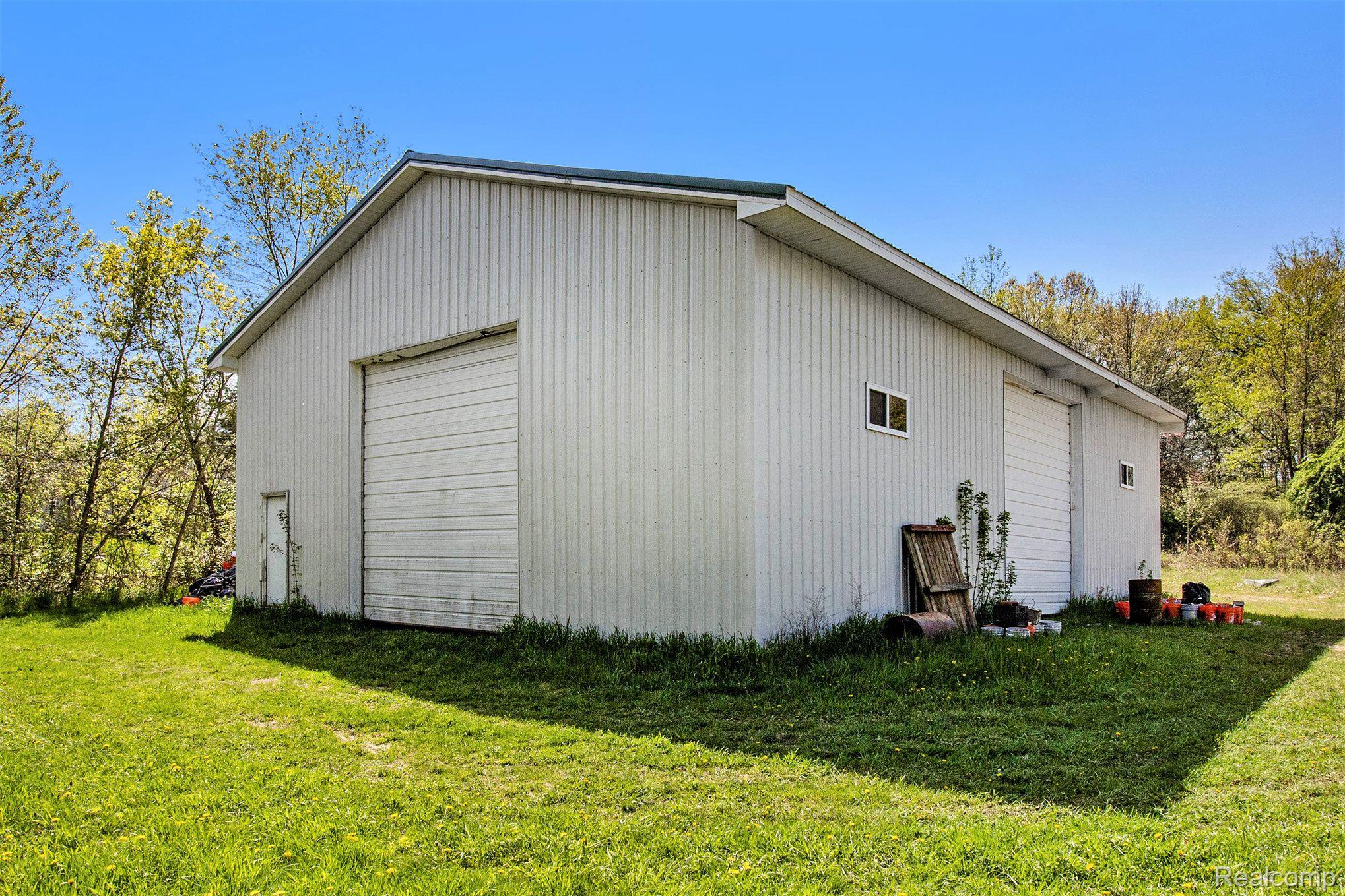 3784 East Allen Road Howell, MI 48855 - Photo 35 of 42 40'x60' Pole Barn 2 Overhead Doors