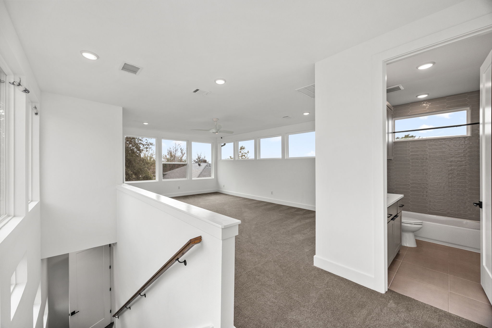 424 Redan Street Houston, TX 77009 - Photo 22 of 47 a view of a kitchen with a sink and wooden floor
