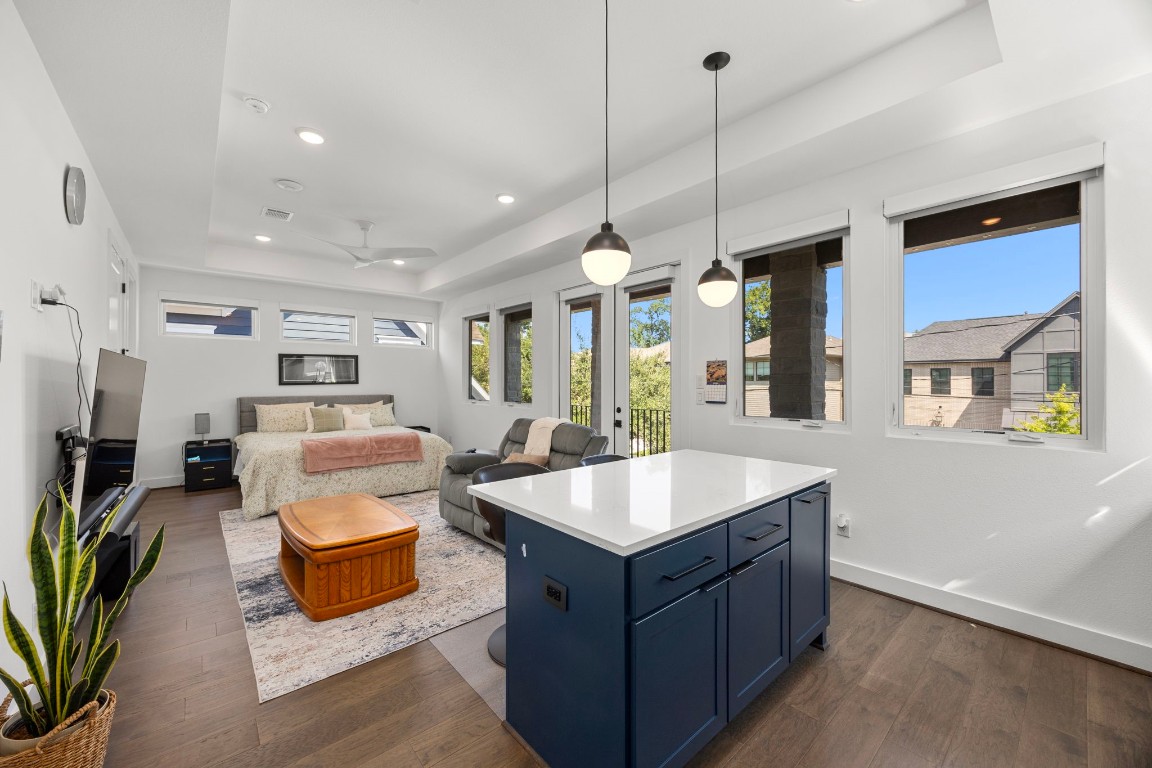 424 Redan Street Houston, TX 77009 - Photo 36 of 47 a living room with furniture a large window and kitchen chandelier