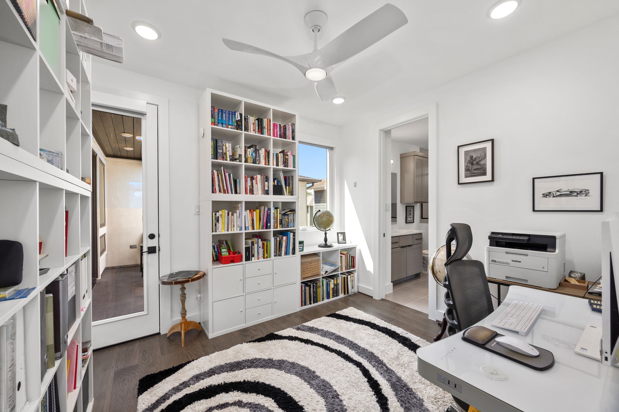 424 Redan Street Houston, TX 77009 - Photo 38 of 47 a bedroom with furniture and a book shelf