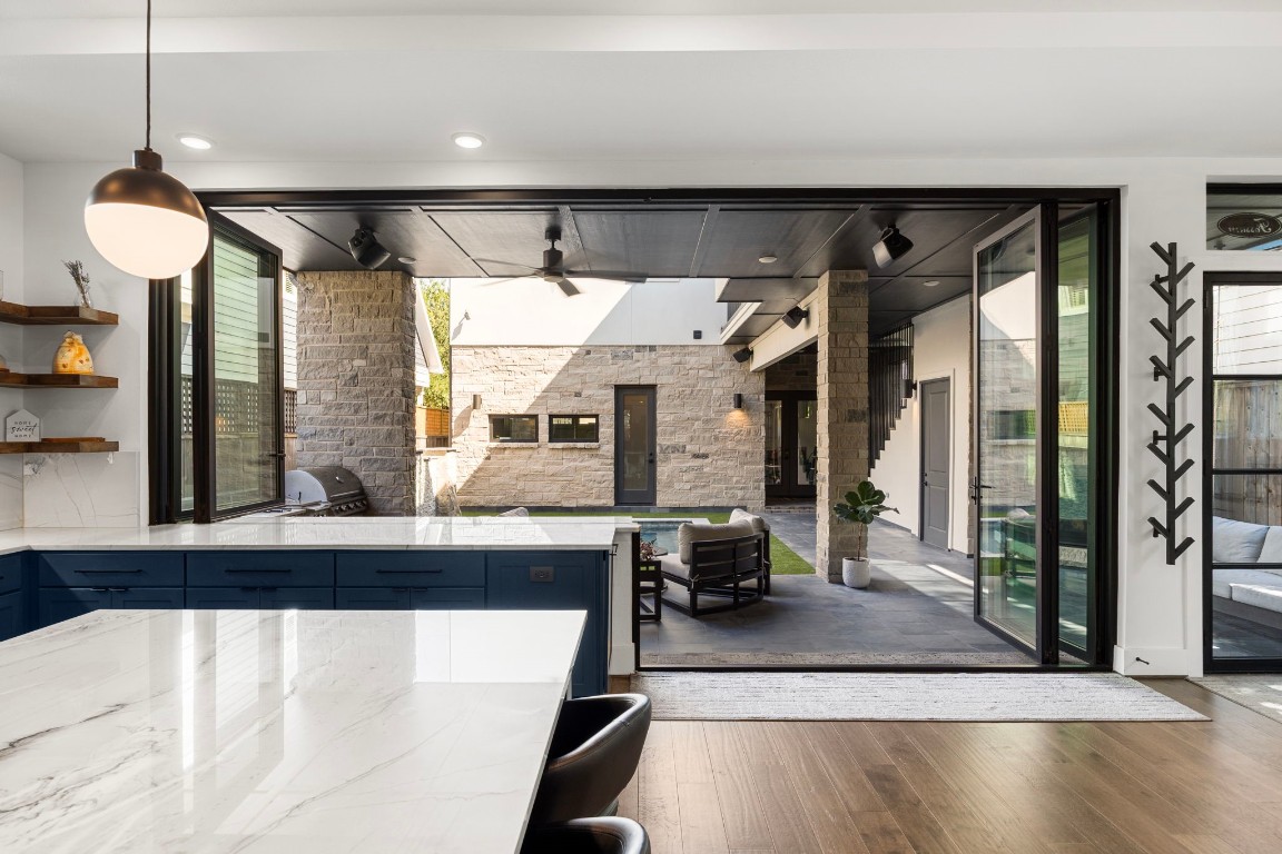 424 Redan Street Houston, TX 77009 - Photo 6 of 47 a view of a living room with furniture and a chandelier