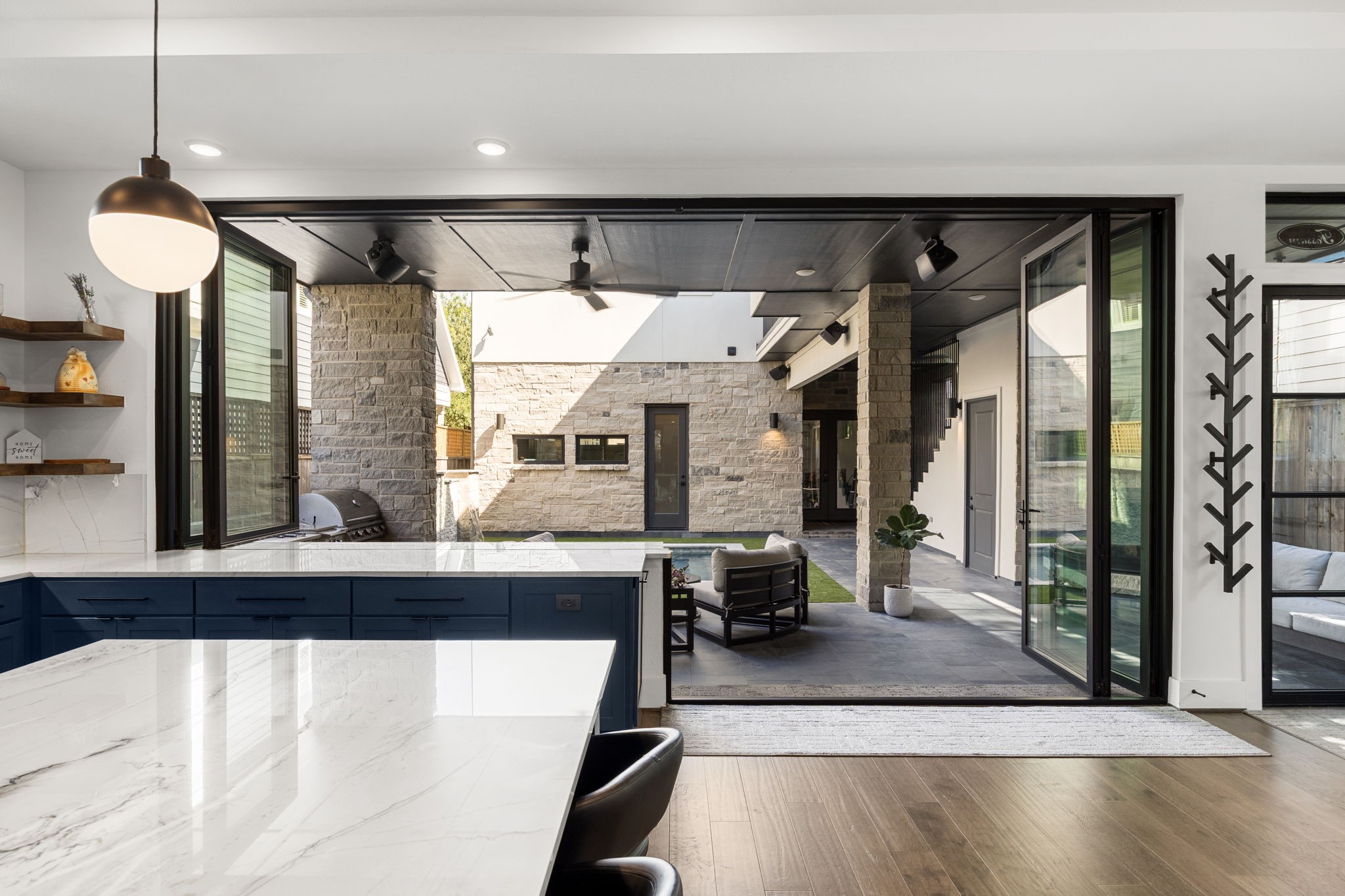 424 Redan Street Houston, TX 77009 - Photo 6 of 47 a view of a living room with furniture and a chandelier