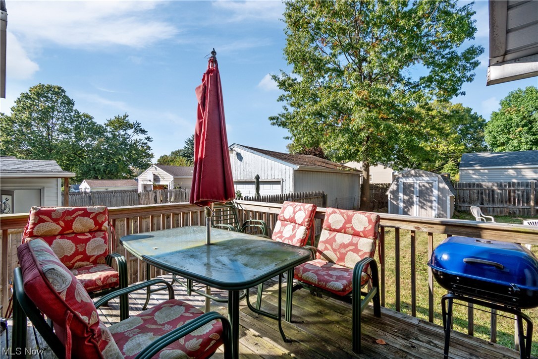 869 Reed Avenue Akron, OH 44306 - Photo 22 of 25 Deck featuring a storage shed and area for grilling