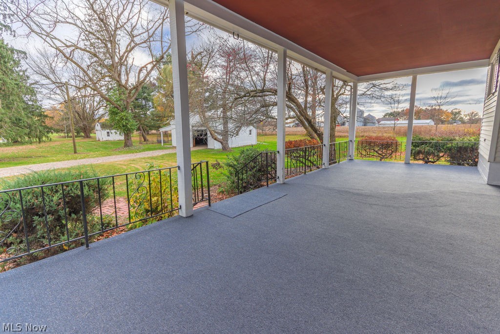51883 Telegraph Road Amherst, OH 44001 - Photo 29 of 49 View of unfurnished sunroom
