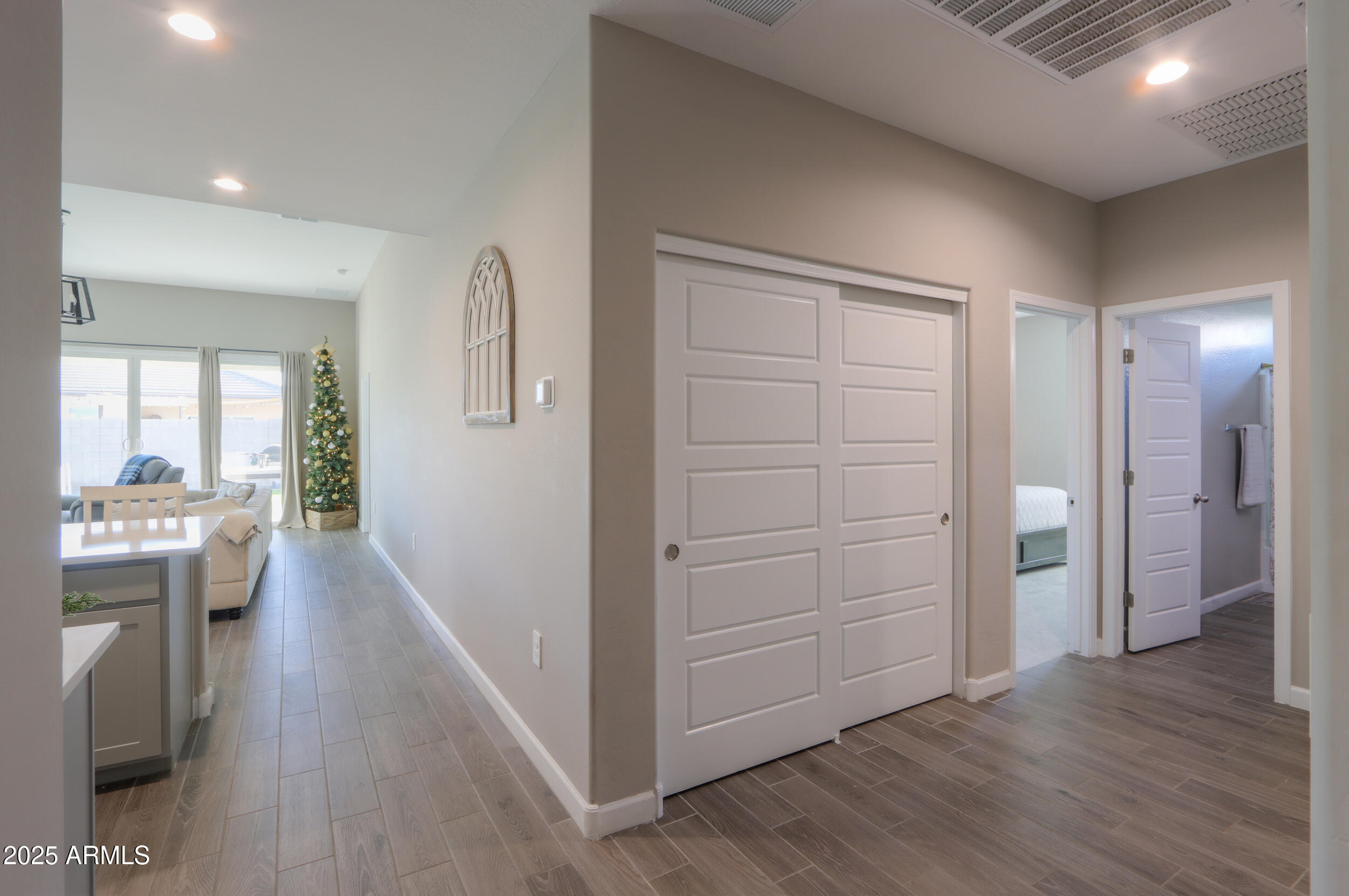 44583 West Palo Olmo Road Maricopa, AZ 85138 - Photo 21 of 43 a view of entryway with kitchen and hallway