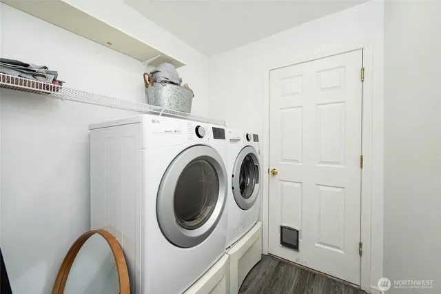 a utility room with dryer and washer