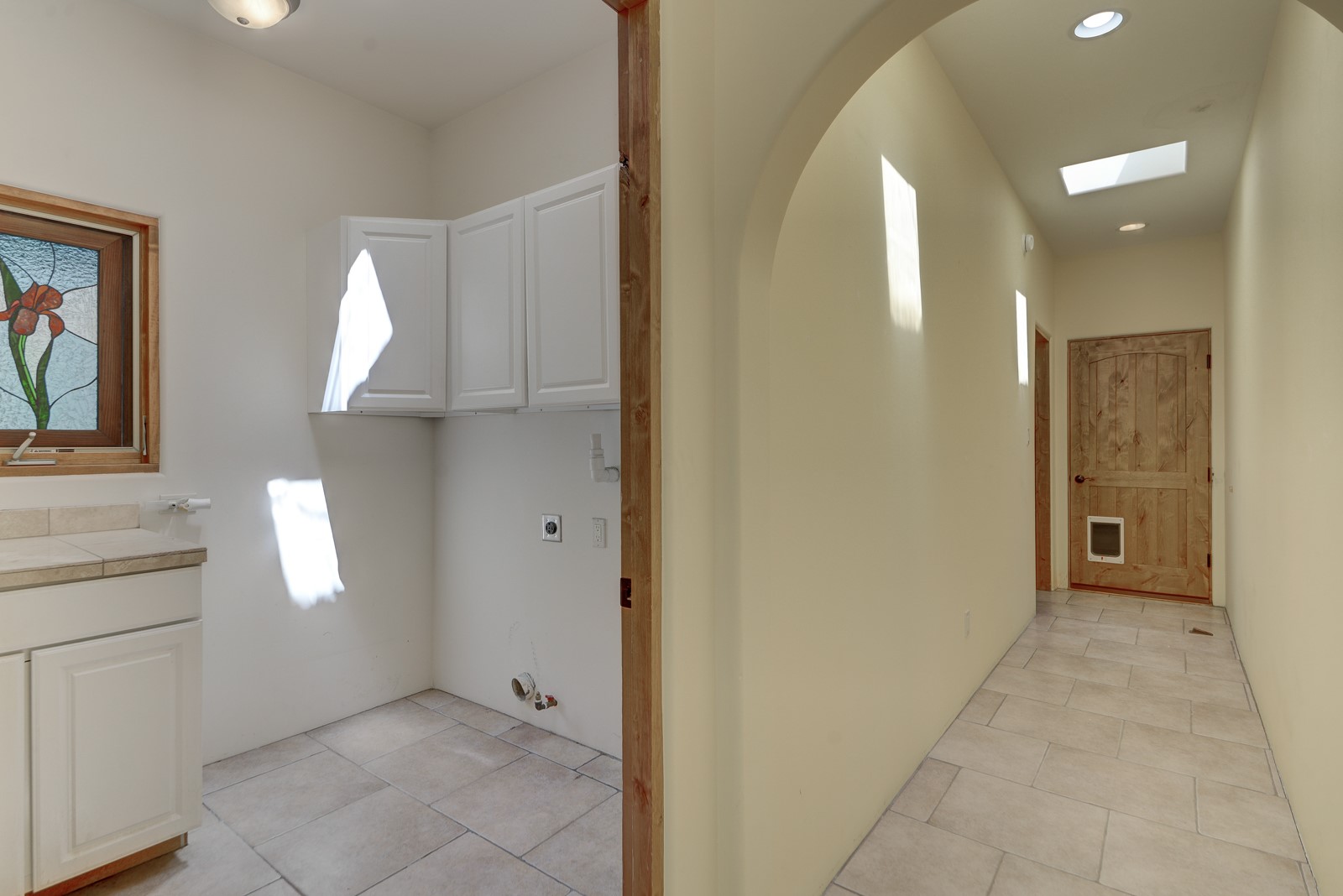 47 Azul Loop Santa Fe, NM 87508 - Photo 33 of 36 Laundry Room & Hallway to Garage