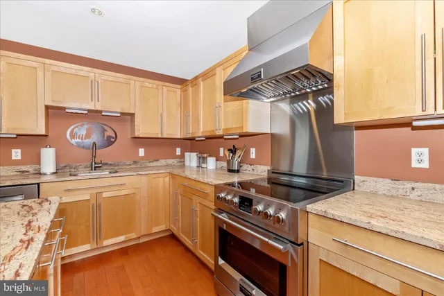 a bedroom with a bed and glass window