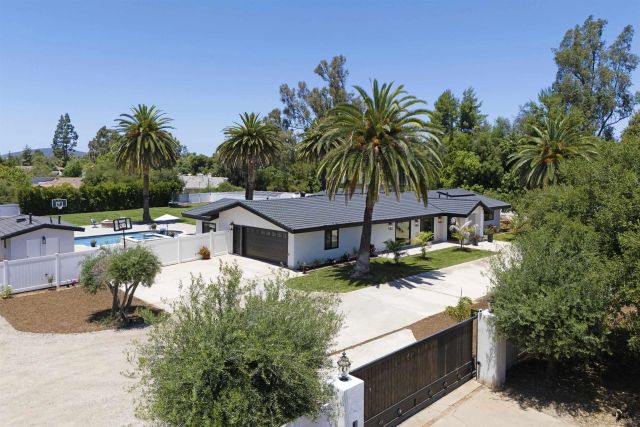 a view of a house with a swimming pool