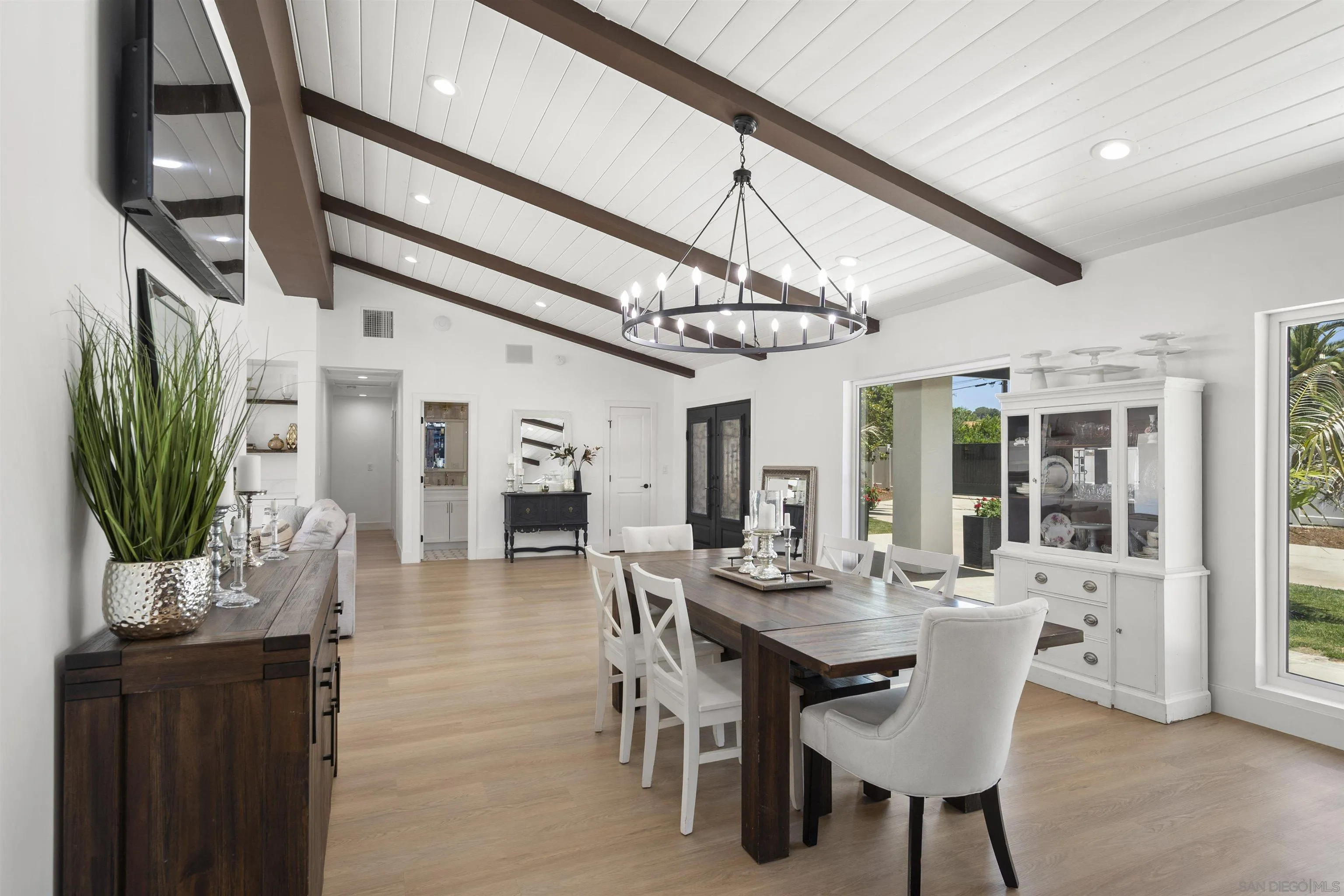 13367 Calle Colina Poway, CA 92064 - Photo 13 of 60 a view of a dining room with furniture window and wooden floor