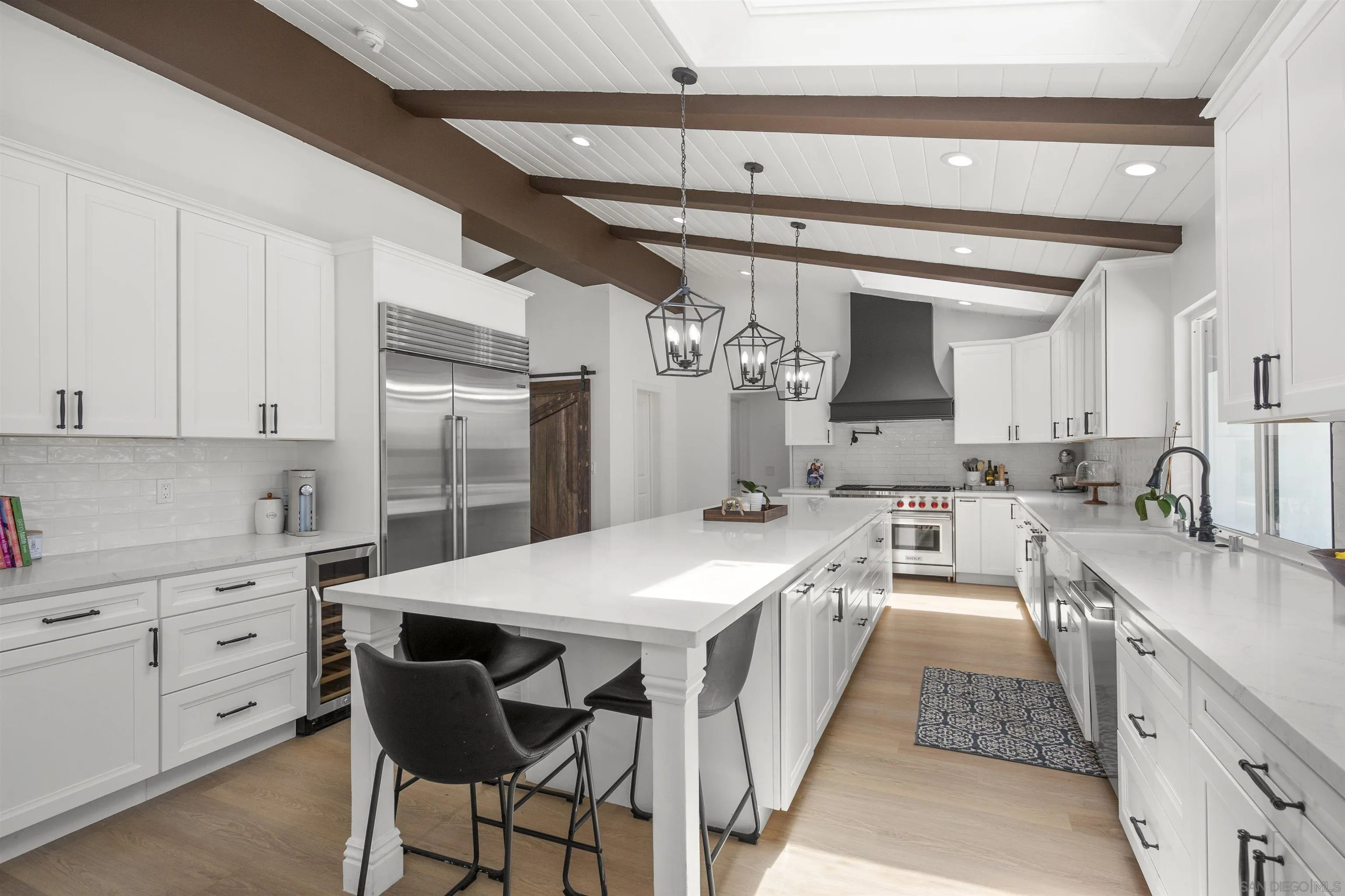 13367 Calle Colina Poway, CA 92064 - Photo 18 of 60 a kitchen with stainless steel appliances kitchen island granite countertop a sink and cabinets