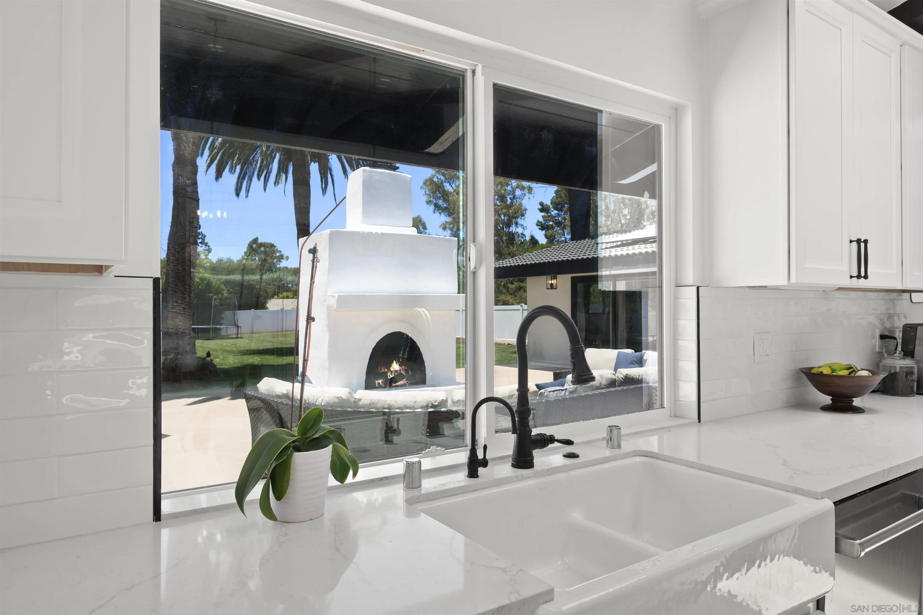 13367 Calle Colina Poway, CA 92064 - Photo 19 of 60 a living room with patio furniture and a flat screen tv