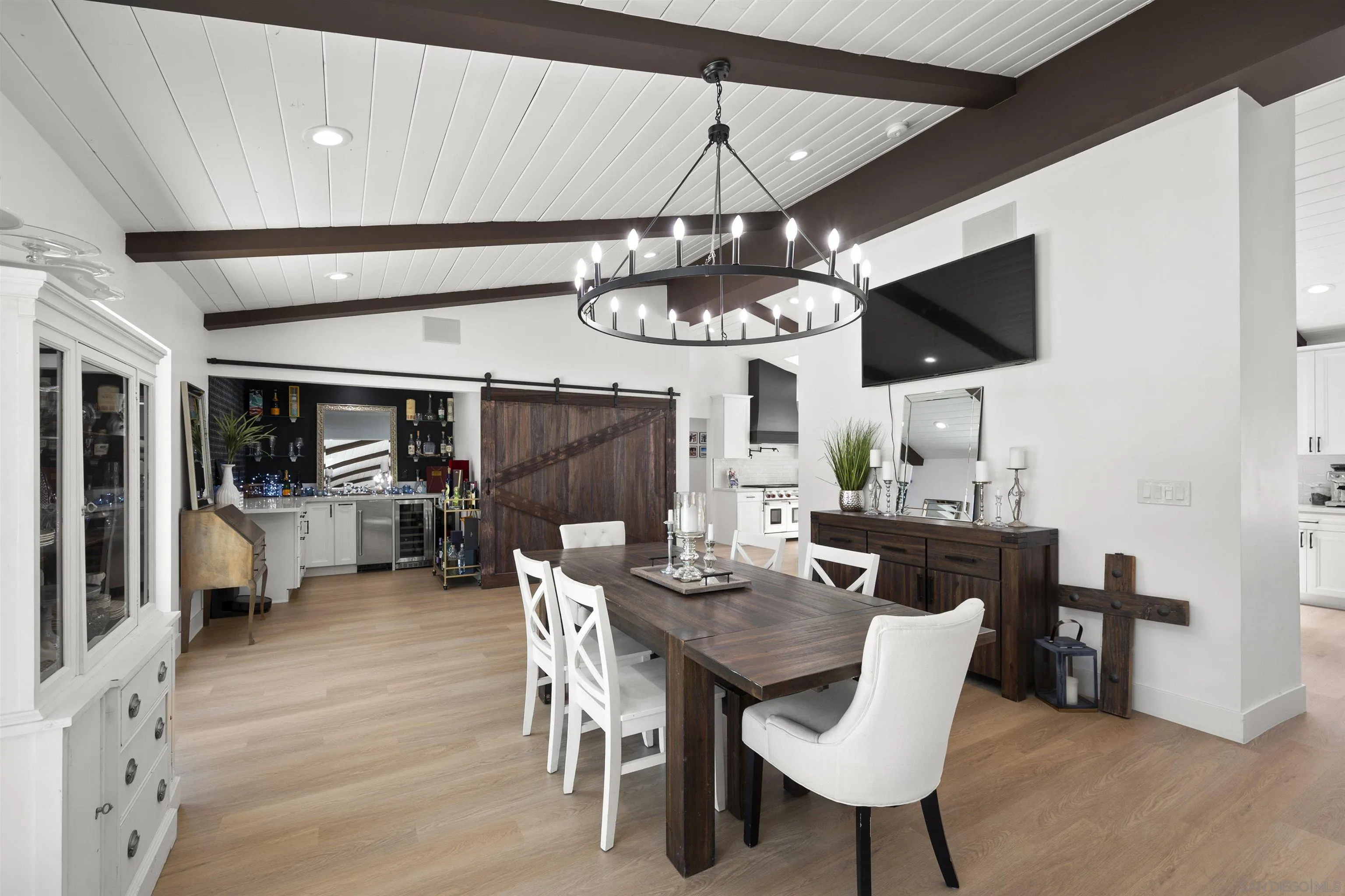 13367 Calle Colina Poway, CA 92064 - Photo 21 of 60 a view of a dining room with furniture wooden floor and chandelier