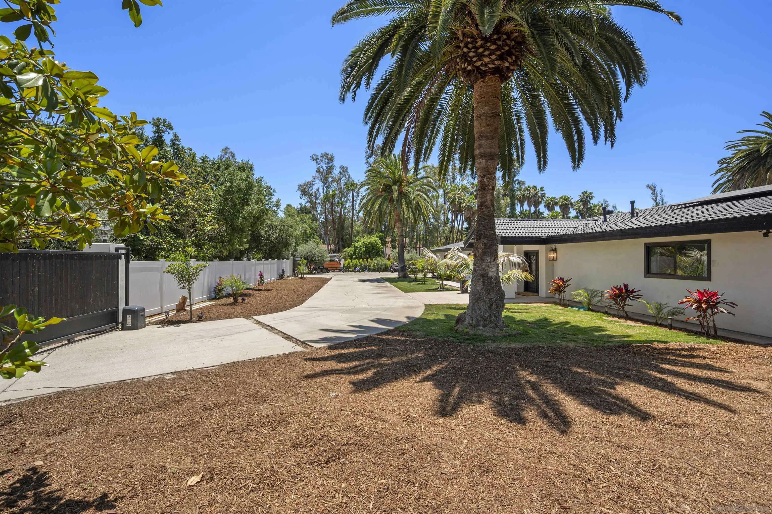 13367 Calle Colina Poway, CA 92064 - Photo 3 of 60 a view of a house with a yard and tree s