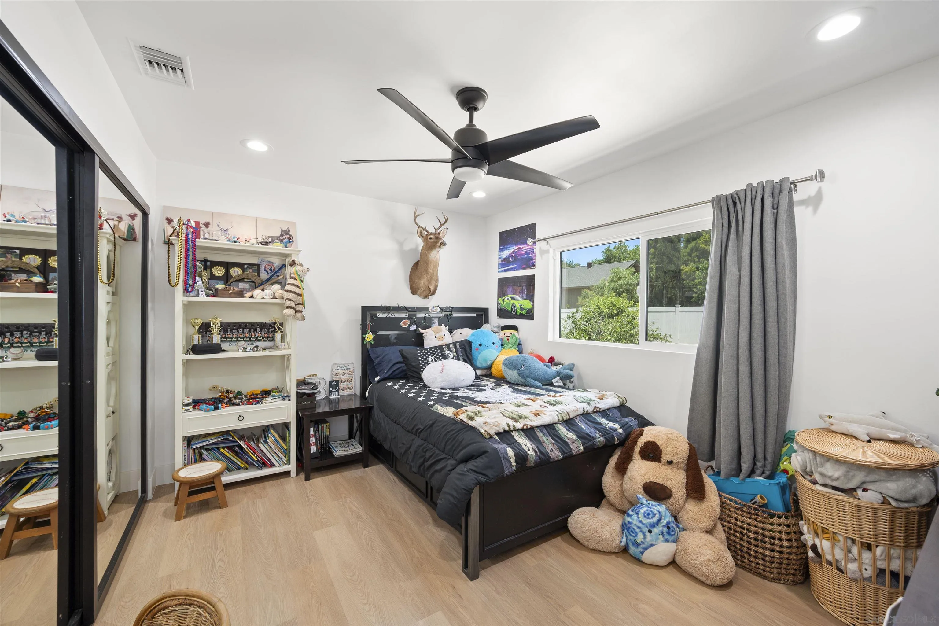 13367 Calle Colina Poway, CA 92064 - Photo 35 of 60 a bedroom with furniture and a window
