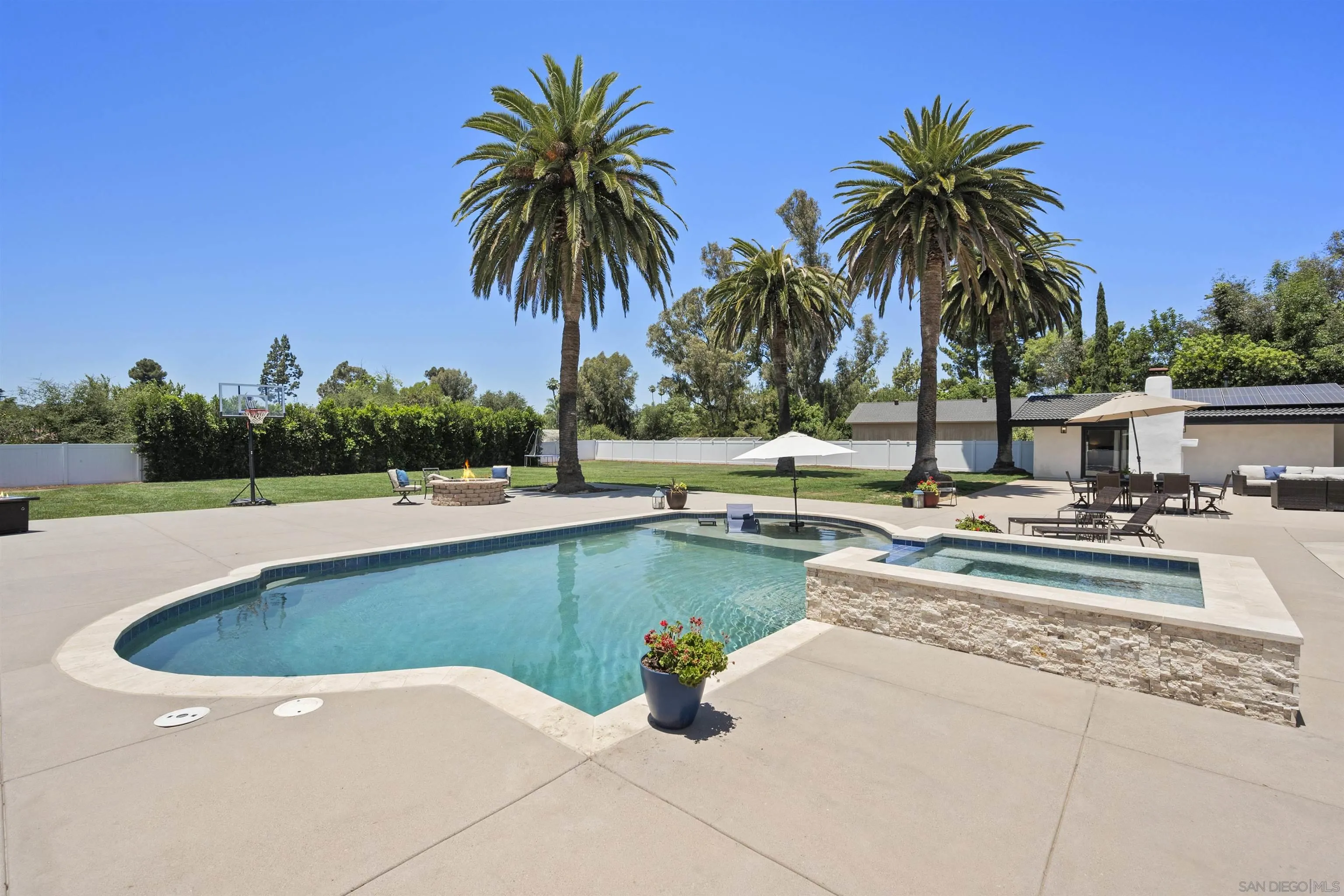 13367 Calle Colina Poway, CA 92064 - Photo 44 of 60 a view of swimming pool with a garden and seating area