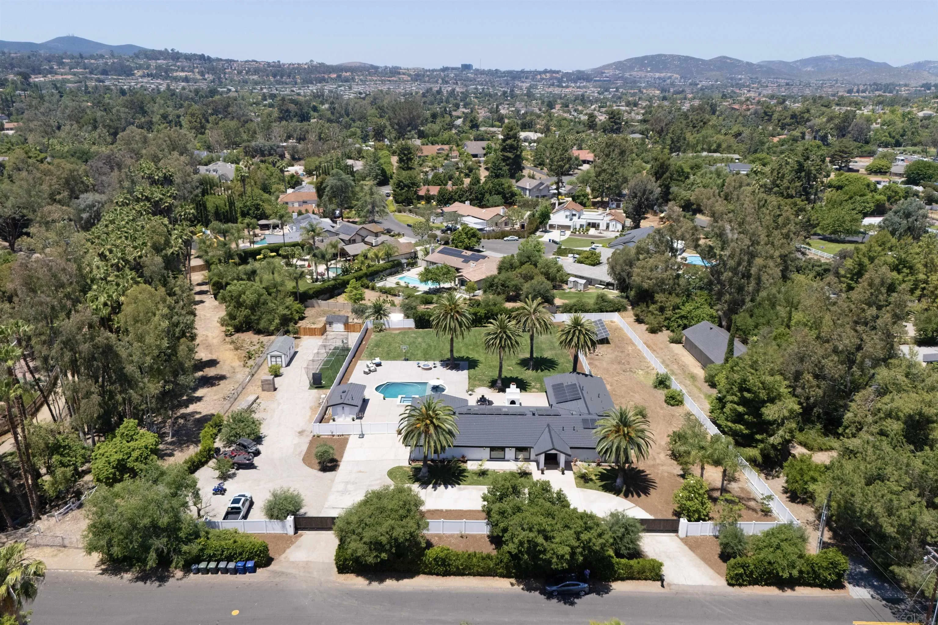 13367 Calle Colina Poway, CA 92064 - Photo 60 of 60 an aerial view of a city with lots of residential buildings and mountain view in back