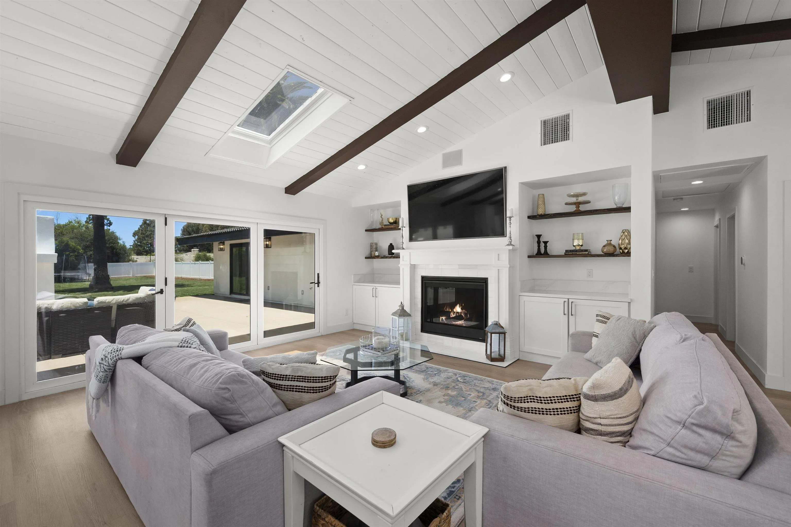 13367 Calle Colina Poway, CA 92064 - Photo 7 of 60 a living room with furniture a fireplace and a flat screen tv