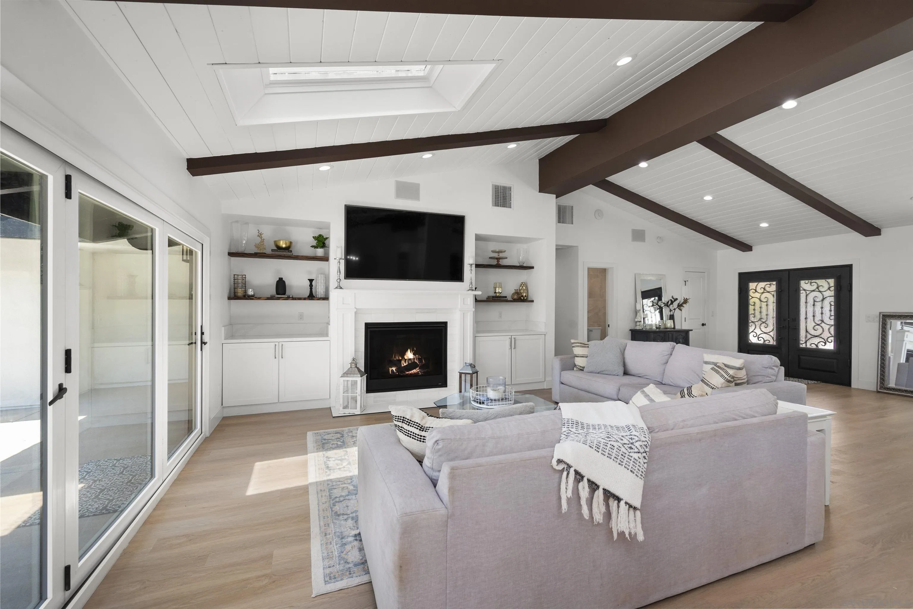 13367 Calle Colina Poway, CA 92064 - Photo 8 of 60 a living room with furniture a fireplace and a flat screen tv