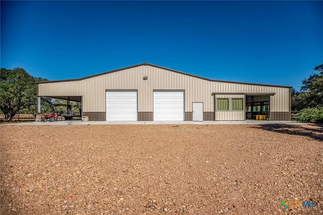 a view of parking garage with cars