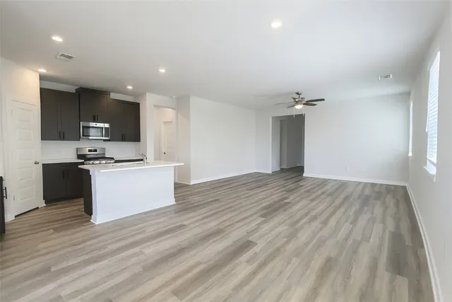 a view of a playground with basketball court