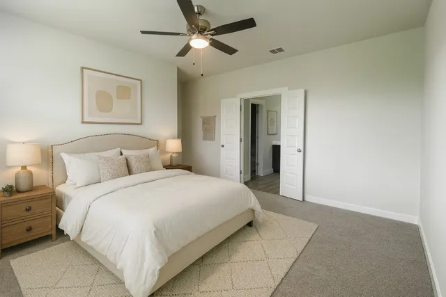 a view of a room with wooden floor and window