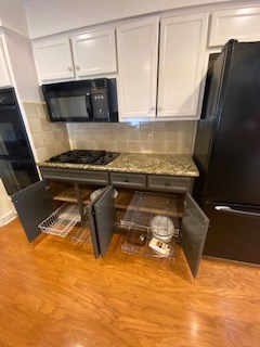 4601 Sears Road Columbus, GA 31907 - Photo 9 of 52 ROLL OUT SHELVES UNDER COOKTOP