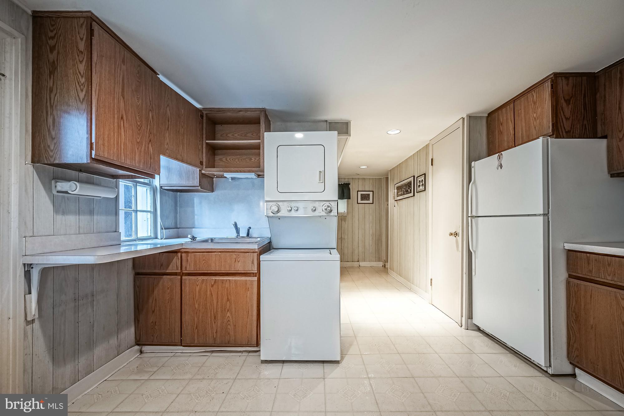 2947 Random Road Falls Church, VA 22042 - Photo 19 of 26 a kitchen with stainless steel appliances granite countertop a refrigerator and a stove