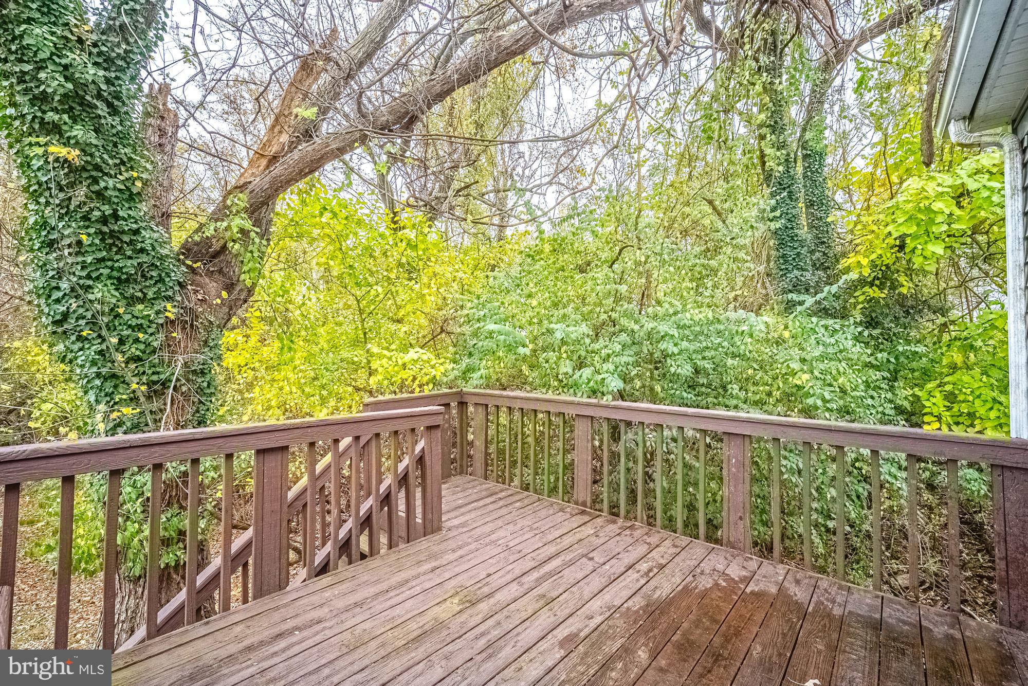 2947 Random Road Falls Church, VA 22042 - Photo 24 of 26 a view of balcony with wooden floor and fence