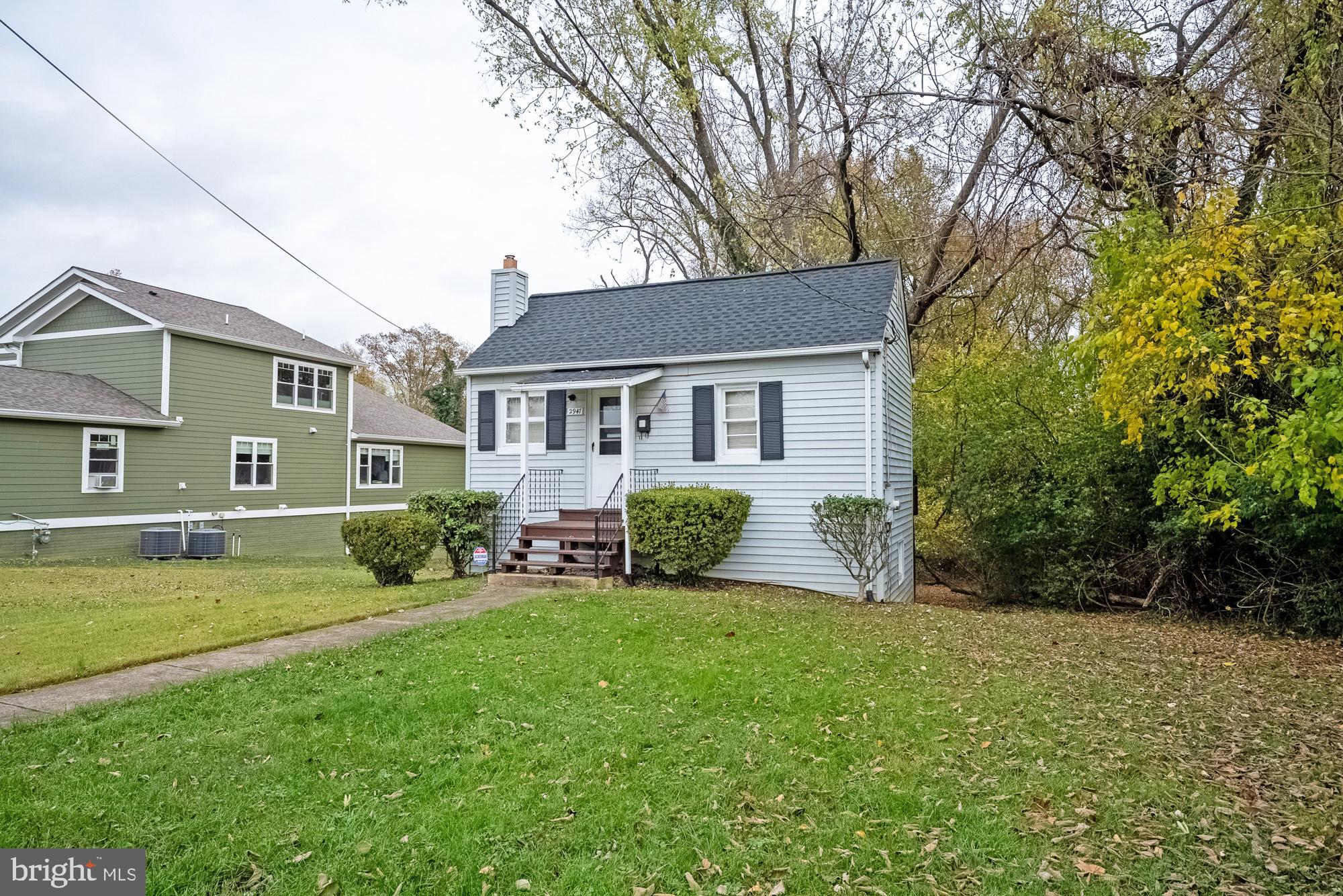 2947 Random Road Falls Church, VA 22042 - Photo 5 of 26 a view of a house with a yard and sitting area