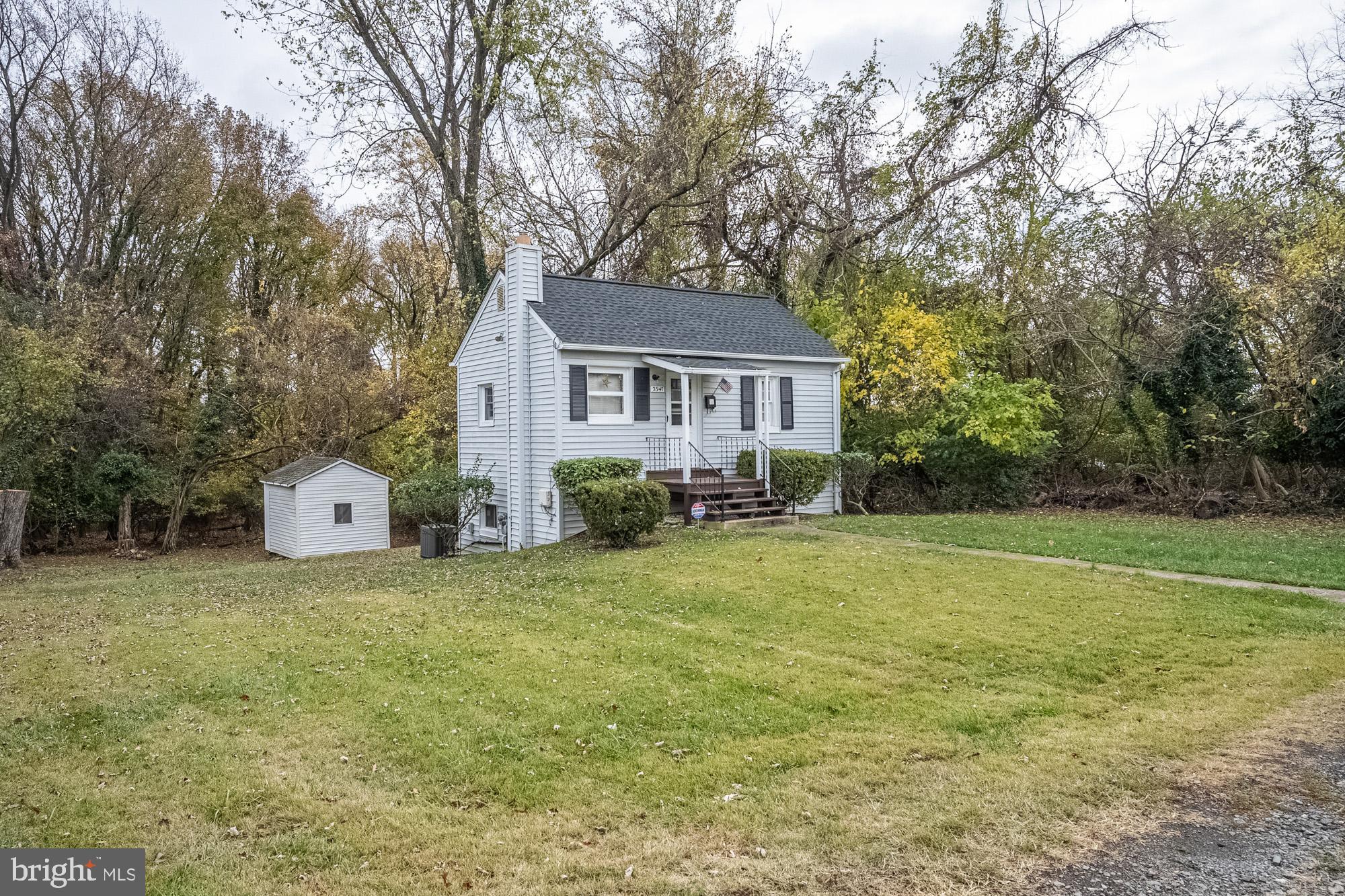 2947 Random Road Falls Church, VA 22042 - Photo 6 of 26 a house with trees in front of it