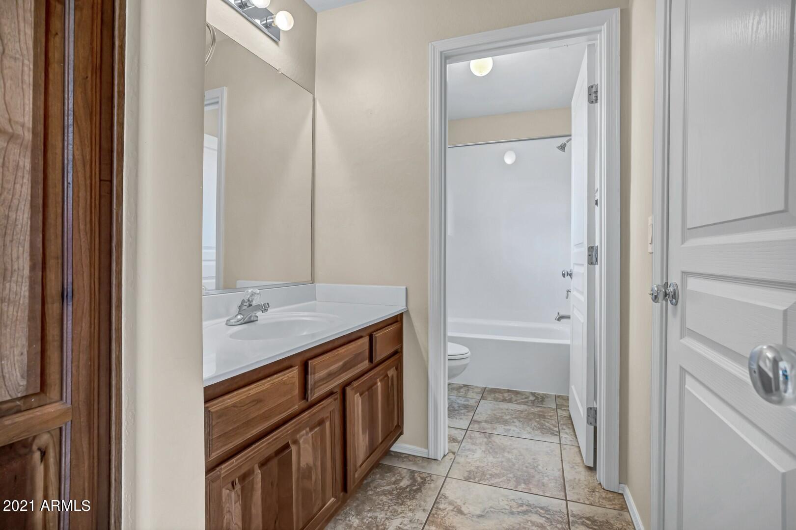 15339 West Charter Oak Road Surprise, AZ 85379 - Photo 25 of 31 Jack-and-Jill Bathroom