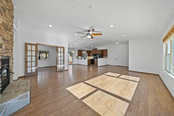 a view of kitchen with wooden floor and window