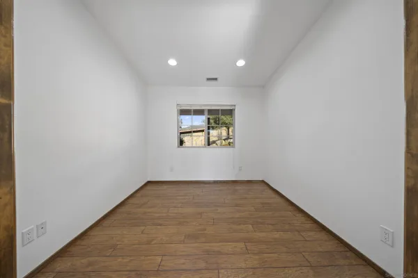 an empty room with an entryway