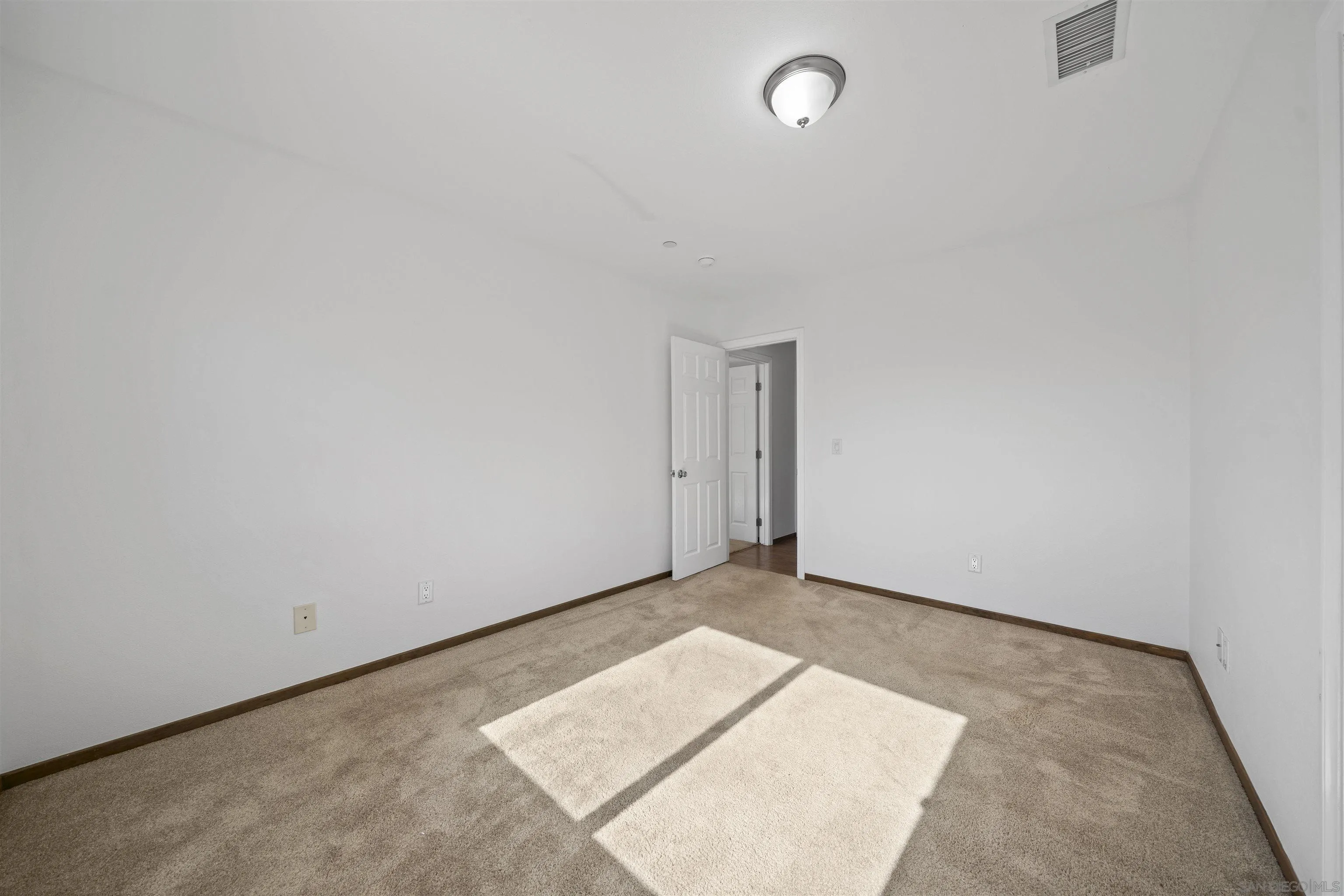20872 Deerhorn Valley Road Jamul, CA 91935 - Photo 24 of 64 an empty room with an entryway