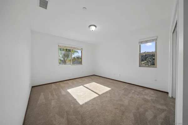 a view of an empty walk in closet